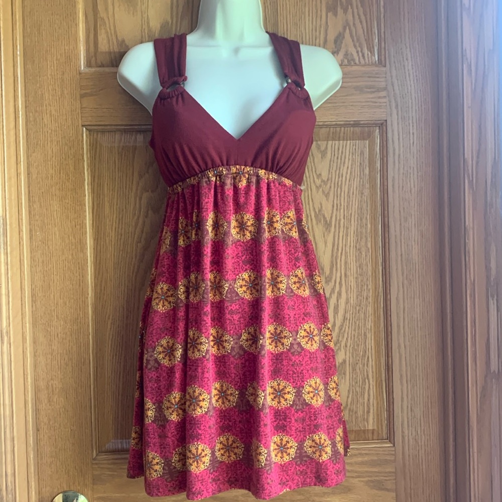 Junior size mini dress. Burgundy with multi colored pattern